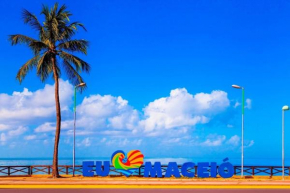 Apartamento à beira-mar bem ventilado e saída para as praias do sul